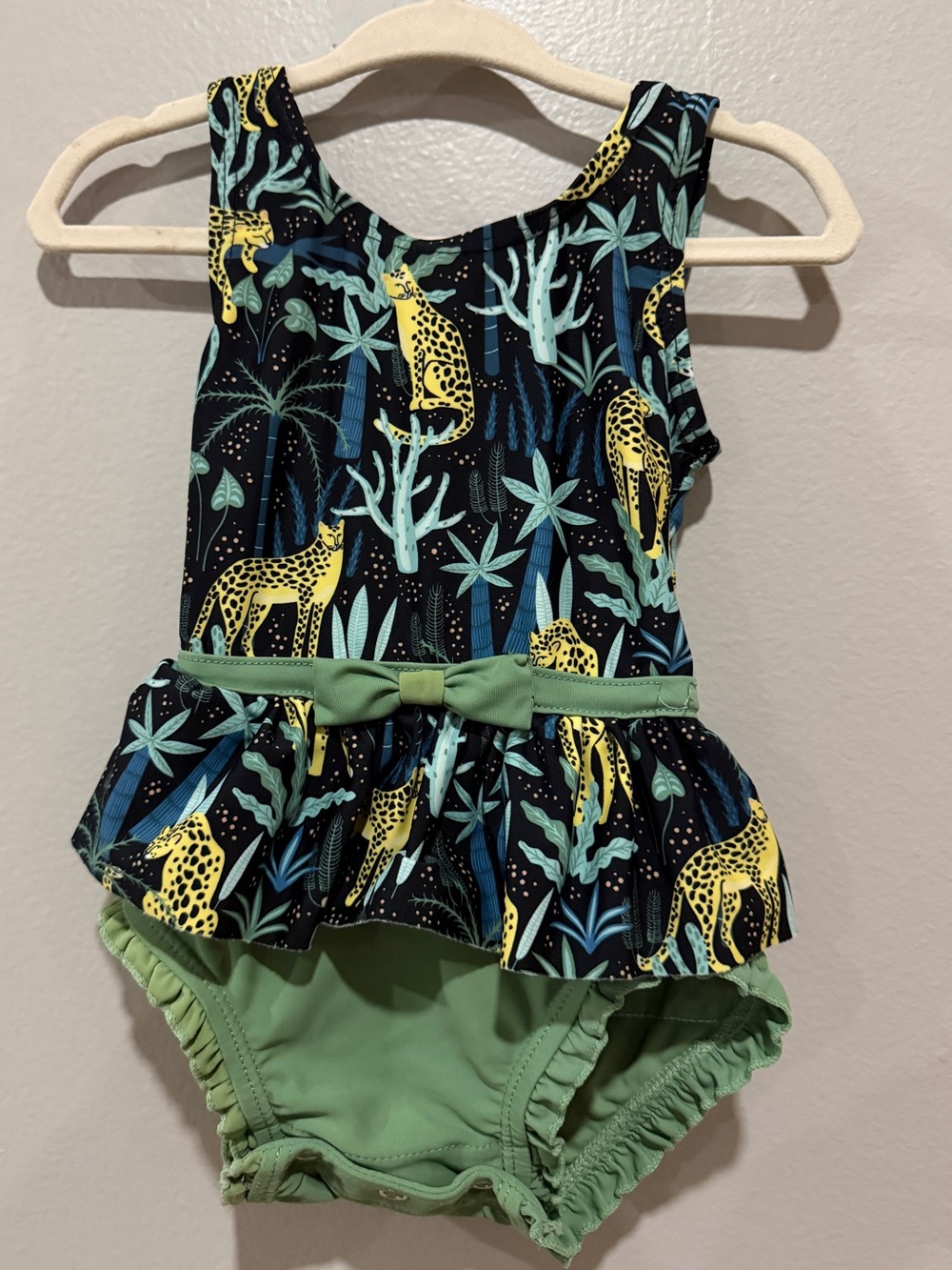 Ruffle Butts Black Swim One-Piece with Yellow Leopard and Green Trim